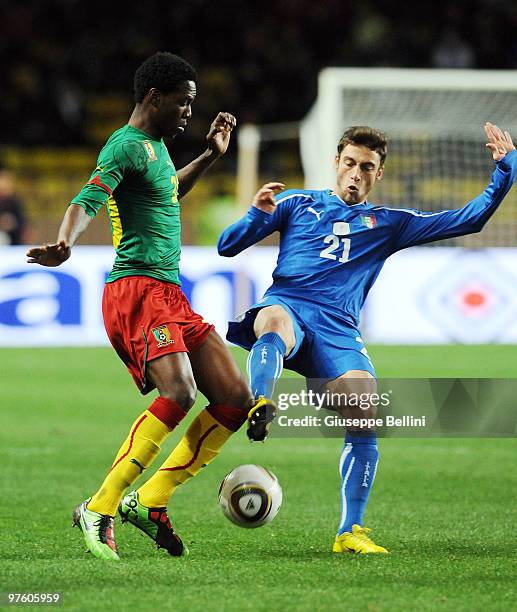 Georges Mandjeck of Cameroon and Claudio Marchisio of Italy in action during the International Friendly match between Italy and Cameroon at Louis II...