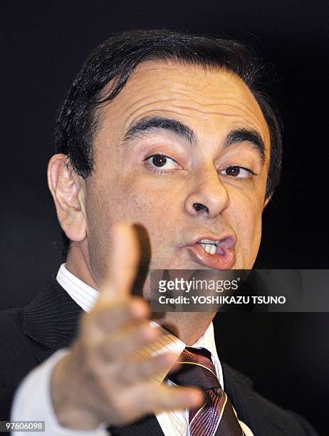 Nissan Chief executive Carlos Ghosn speaks at a symposium for the 150th anniversary of Japan-France friendship at Tokyo University on December 1,...