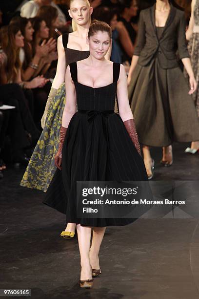 Laetitia Casta walks the runway during the Louis Vuitton Ready to Wear show as part of the Paris Womenswear Fashion Week Fall/Winter 2011 at Cour...