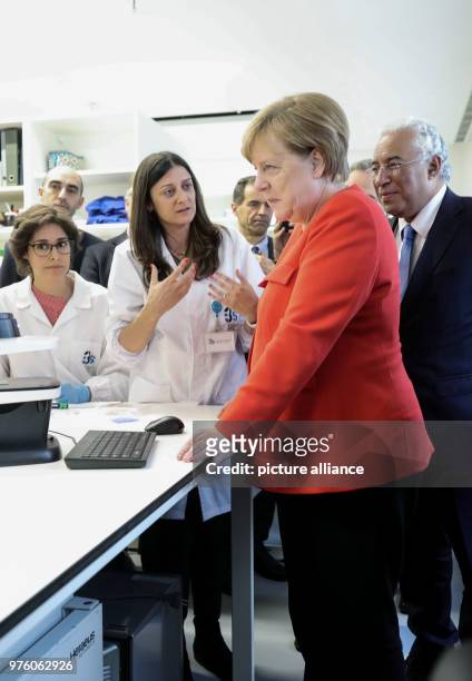 May 2018, Portugal, Lisbon: German Chancellor Angela Merkel and Portugese President António Costa speaking to students at the institute for health...