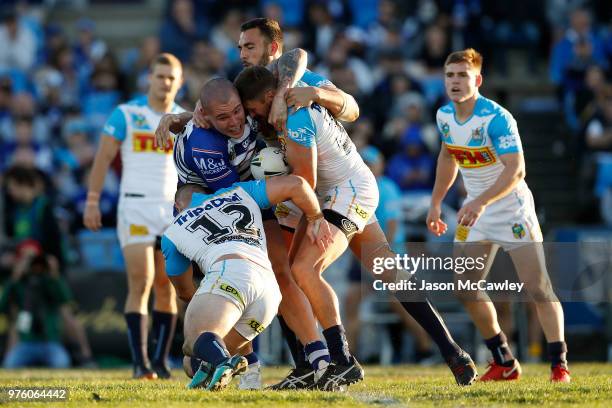 David Klemmer of the Bulldogs is tackled during the round 15 NRL match between the Canterbury Bulldogs and the Gold Coast Titans at Belmore Sports...