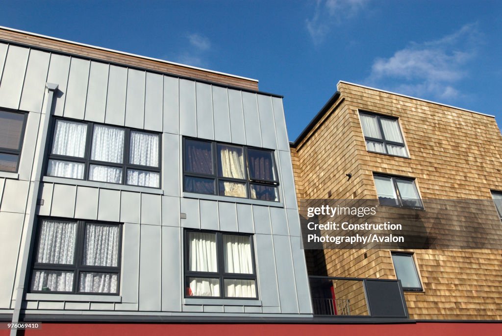 Shuingle Cladding zinc sheet and cedar shingle cladding on a modern mixed-use... News ...