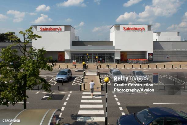 Supermarket car park with pedestrian 'zebra' crossings, Harlow, Hertfordshire, UK.
