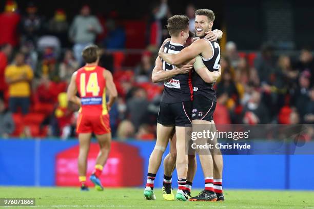 Saints celebrate winning the round 13 AFL match between the Gold Coast Suns and the St Kilda Saints at Metricon Stadium on June 16, 2018 in Gold...