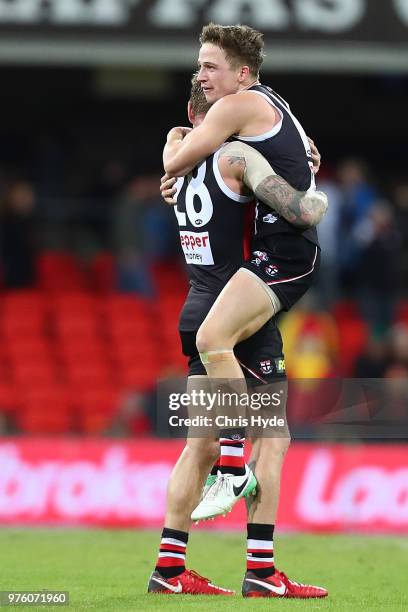 Jack Billings of the Saints celebrates winning the round 13 AFL match between the Gold Coast Suns and the St Kilda Saints at Metricon Stadium on June...