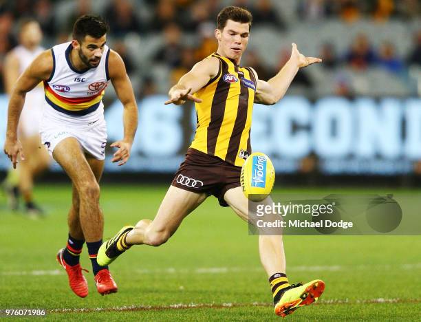 Jaeger O'Meara of the Hawks kicks the ball during the round 13 AFL match between the Hawthorn Hawks and the Adelaide Crows at Melbourne Cricket...