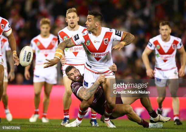Paul Vaughan of the Dragons looks to offload during the round 15 NRL match between the St George Illawarra Dragons and the Manly Sea Eagles at WIN...