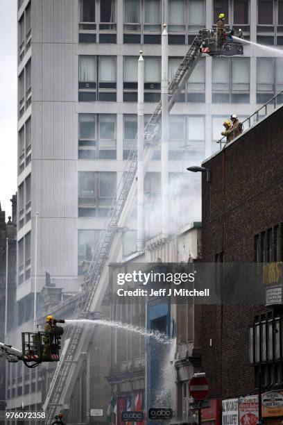 Fire fighters battle a blaze at the Glasgow School of Art and O2 ABC Glasgow on June 16, Glasgow Scotland. In May 2014 it was devastated by a huge...