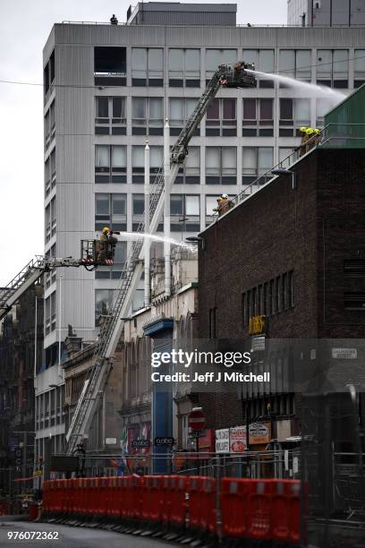 Fire fighters battle a blaze at the Glasgow School of Art and O2 ABC Glasgow on June 16, Glasgow Scotland. In May 2014 it was devastated by a huge...