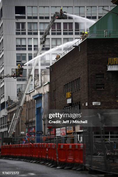 Fire fighters battle a blaze at the Glasgow School of Art and O2 ABC Glasgow on June 16, Glasgow Scotland. In May 2014 it was devastated by a huge...