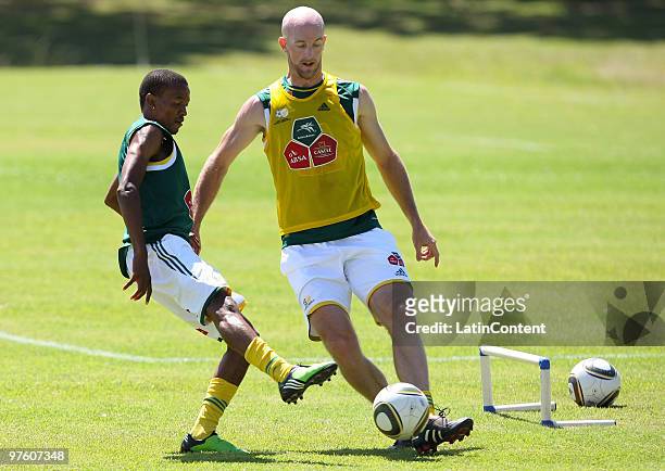 Bafana Bafana's Matthew Booth vies for the ball during the South Africa national soccer team training session held at the Granja Comary on March 10,...