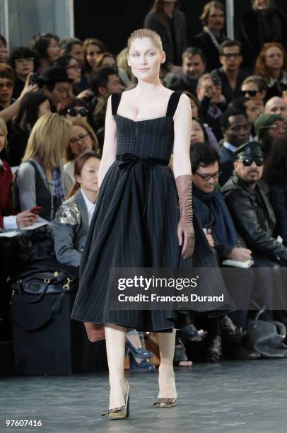 Model Laetitia Casta walks the runway during the Louis Vuitton Ready to Wear show as part of the Paris Womenswear Fashion Week Fall/Winter 2011 at...