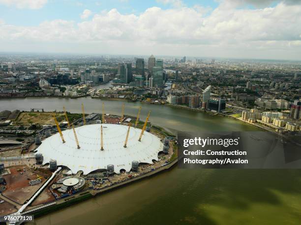 Millennium Dome on the Greenwich Peninsula and Canary Wharf, London Docklands, UK.