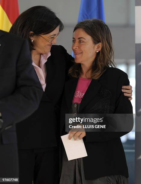 Spanish Secretary of State for International Cooperation Soraya Rodriguez conforts Spanish aid worker Alicia Gamez , upon her arrival at Barcelona's...