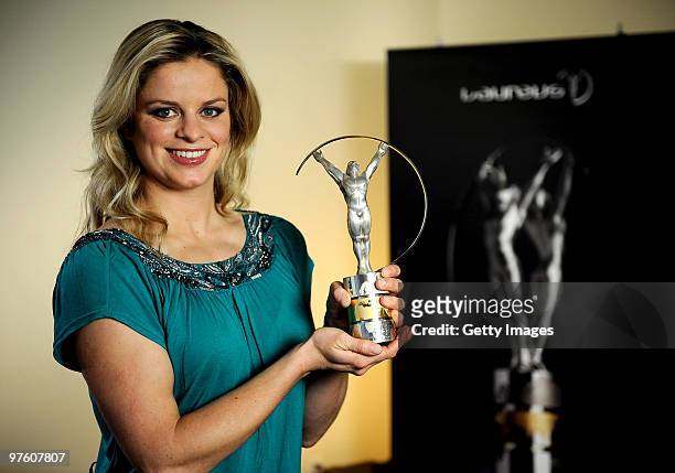 Kim Clijsters poses with her award for " Laureus World Comeback of the Year" during the Laureus World Sports Awards 2010 on March 10, 2010 in Abu...