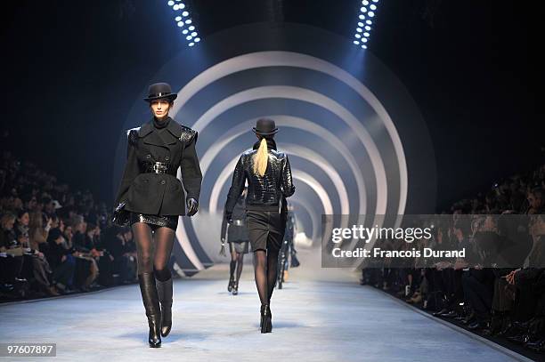 Models walk the runway during the Hermes Ready to Wear show as part of the Paris Womenswear Fashion Week Fall/Winter 2011 at Halle Freyssinet on...