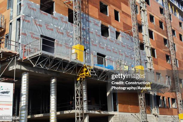 Insulation instalment on building, Barking, Essex, UK.