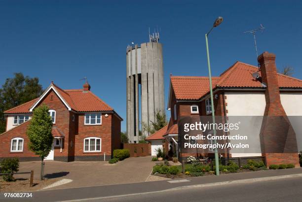 Detached houses near water tower, Ipswich, Suffolk, UK.