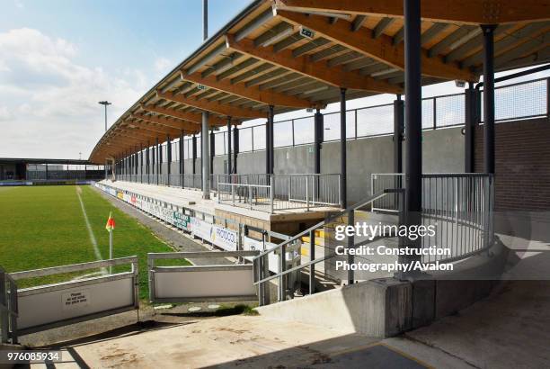 Cedar roof on terraced stand, Princes Park, Dartford FC, South East London, UK.