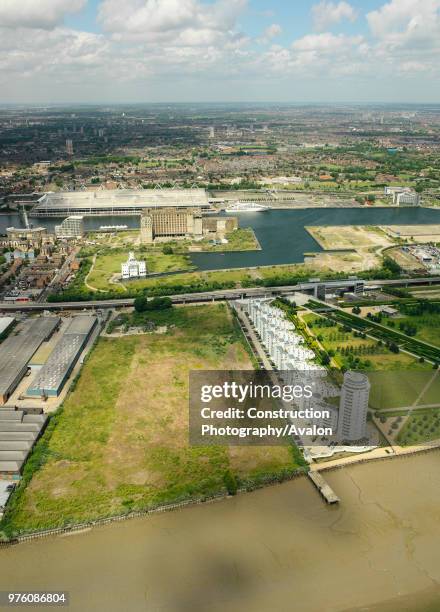 Aerial view of ExCel Exhibition Centre on Royal Victoria Dock and Barrier Point, a landmark housing development by Barratt, London Docklands, Thames...