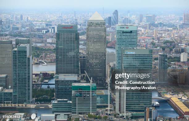 Aerial view of Canary Wharf with the City of London in the background, UK.