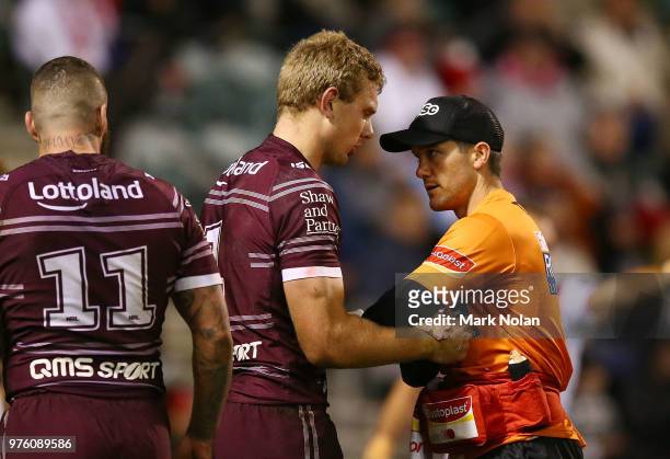 Thomas Trbojevic of the Eagles is treated for an injury during the round 15 NRL match between the St George Illawarra Dragons and the Manly Sea...