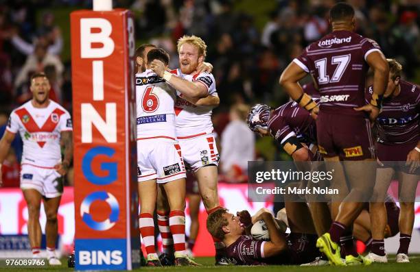 James Graham of the Dragons celebrates scoring a try during the round 15 NRL match between the St George Illawarra Dragons and the Manly Sea Eagles...