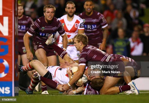 James Graham of the Dragons crashes over for a try during the round 15 NRL match between the St George Illawarra Dragons and the Manly Sea Eagles at...
