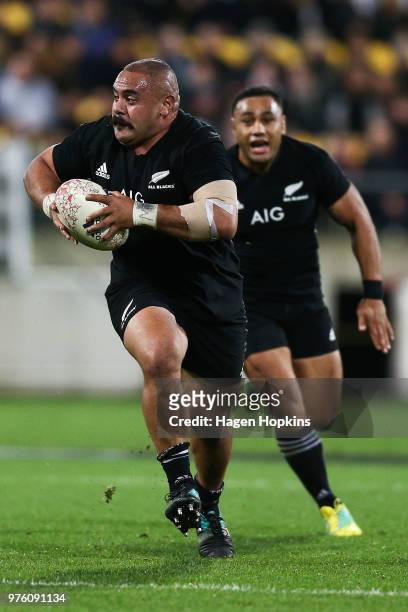 Karl TuÕinukuafe of New Zealand makes a break with Ngani Laumape in support during the International Test match between the New Zealand All Blacks...