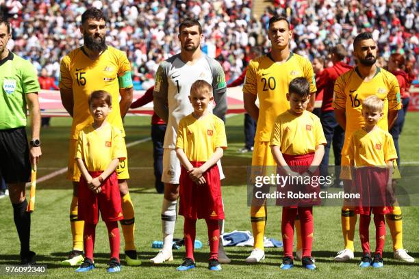 Mile Jedinak, Mathew Ryan, Trent Sainsbury and Aziz Behich of Australia line up ahead of during the 2018 FIFA World Cup Russia group C match between...