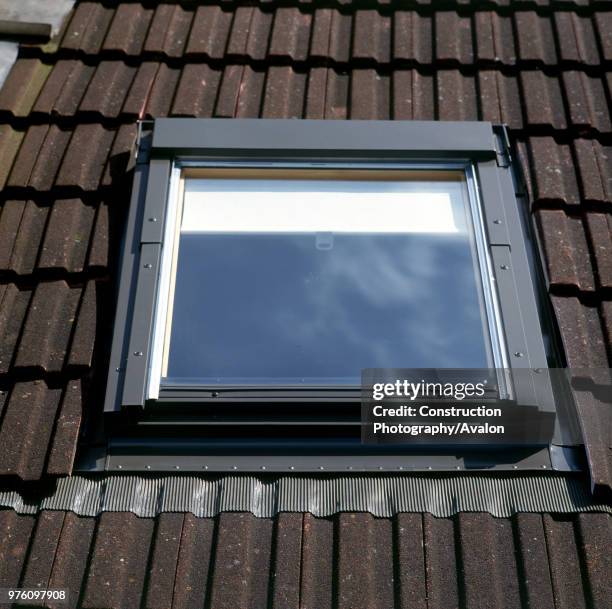 Loft conversion Velux window installed in the attic.