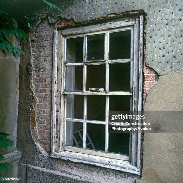 Old window in total decay.