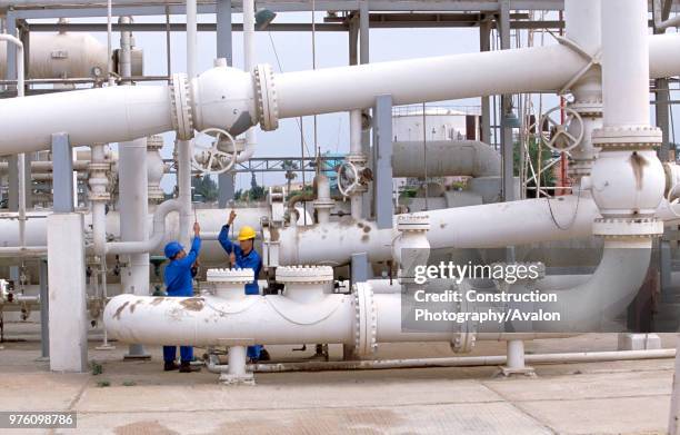 Workers at gas refinery in Western Desert, Egypt.