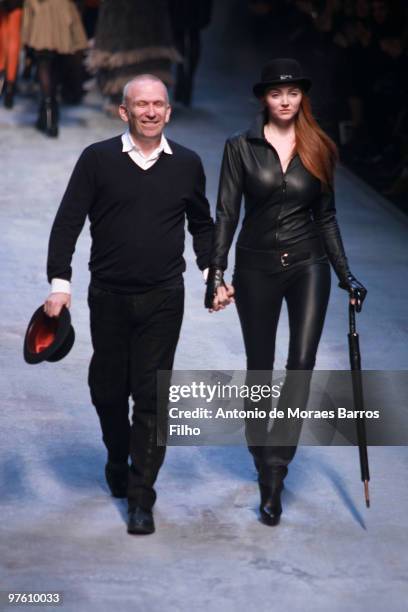 Designer Jean-Paul Gaultier and model Lily Cole walk the runway at the end of the Hermes Ready to Wear show as part of the Paris Womenswear Fashion...