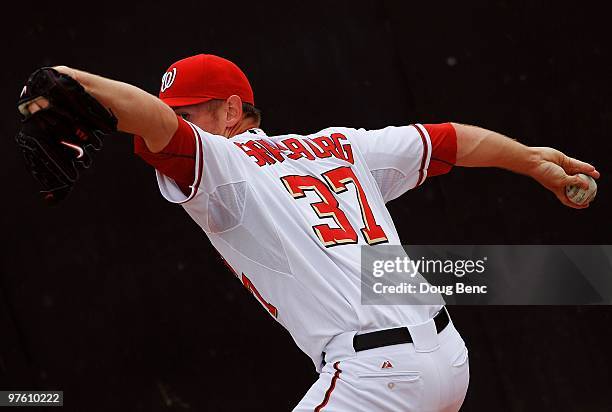 Starting pitcher Stephen Strasburg of the Washington Nationals warms up in the bullpen before facing the Detroit Tigers at Space Coast Stadium on...