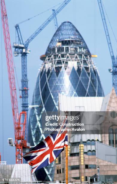 The 'Union Jack' in front of The Gherkin , City of London, United Kingdom Designed by Sir Norman Foster and Partners.