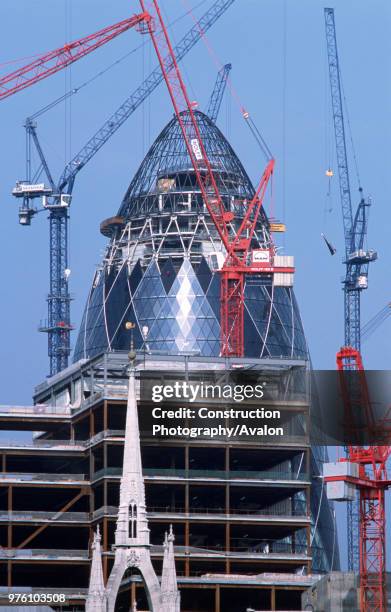 The Gherkin nearing completion, City of London, United Kingdom Designed by Sir Norman Foster and Partners.