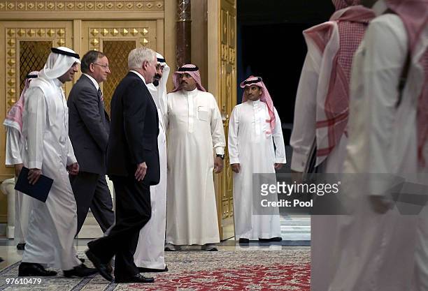 Defence Secretary Robert Gates walks next to Saudi King Abdullah bin Abdul Aziz at the Janadriyah farm on March 10, 2010 in Riyadh, Saudi Arabia....