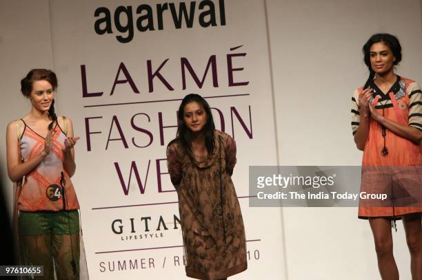 Model walk the ramp wearing Neha Agarwal's outfit at the Lakme Fashion Week 2010.