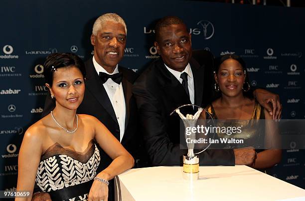 Dorys Erving the wife of former basketball player Julius Erving with US basketball legend Dikembe Mutombo and his wife Rose Mutumbo arrive at the...