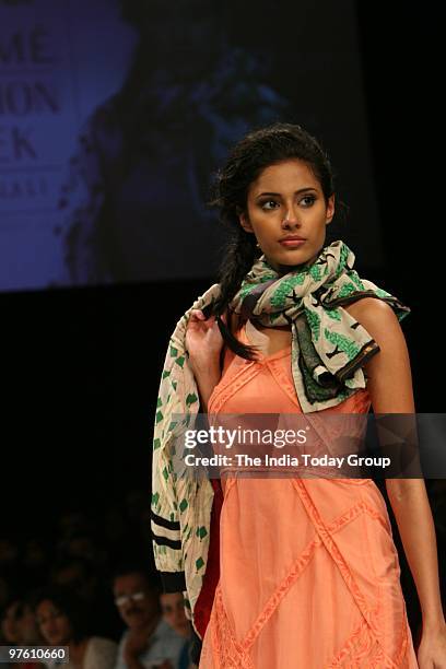 Model walks the ramp wearing Neha Agarwal's outfit at the Lakme Fashion Week 2010.