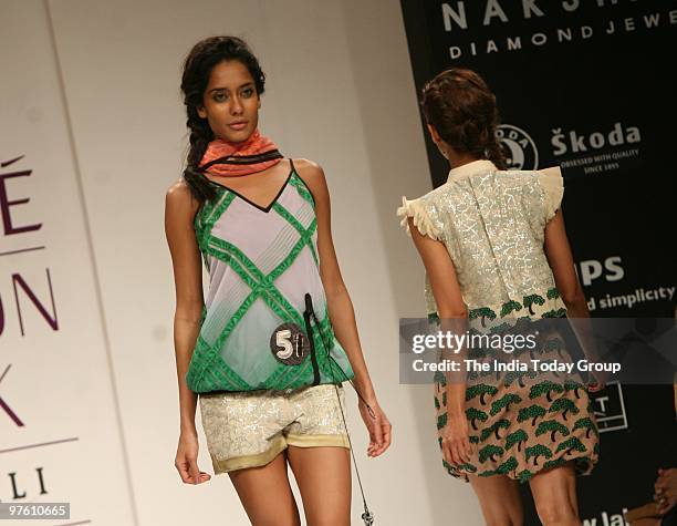 Model walks the ramp wearing Neha Agarwal's outfit at the Lakme Fashion Week 2010.