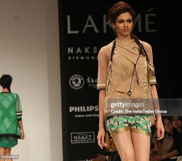 Model walks the ramp wearing Neha Agarwal's outfit at the Lakme Fashion Week 2010.