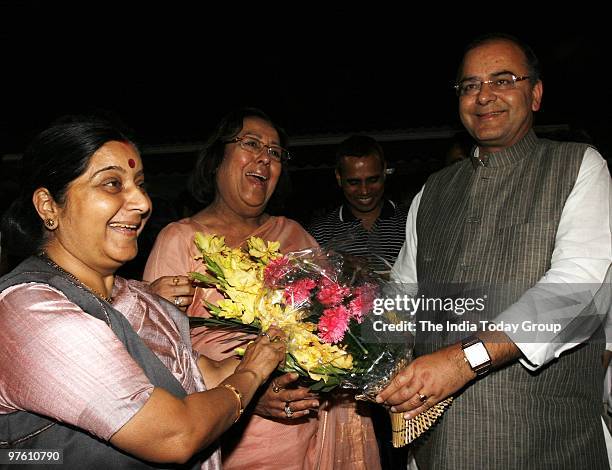 Leaders Najma Heptullah, Sushma Swaraj celebrating with Arun Jaitley outside Parliament after Rajya Sabha passes Women's Reservation Bill on Tuesday,...