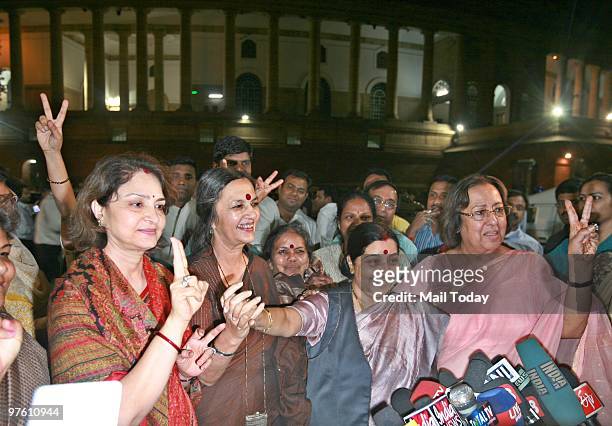 Leader of Opposition in Lok Sabha Sushma Swaraj, BJP leader Najma Heptullah and CPI leader Brinda Karat celebrate the passing of Women's Reservation...