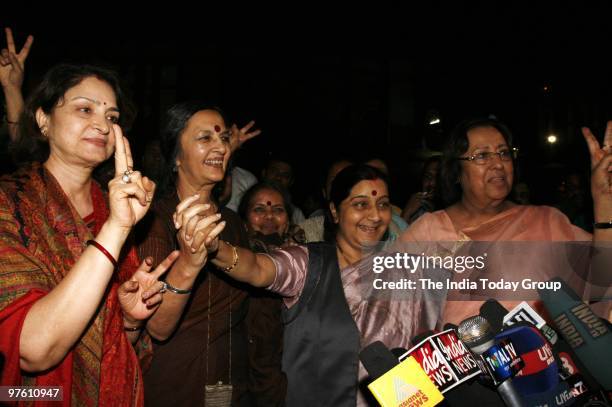 Najma Heptullah, Sushma Swaraj, Brinda Karat and Maya Singh celebrate outside Parliament after Rajya Sabha passes Women's Reservation Bill on...