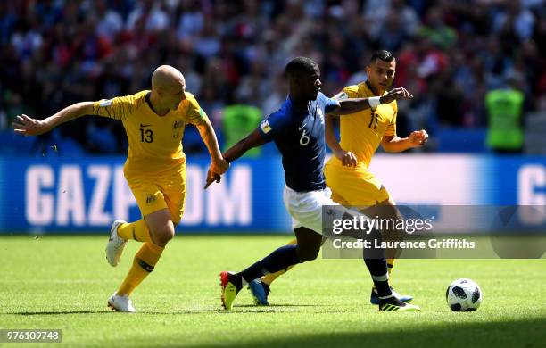 Aaron Mooy and team mate Andrew Nabbout of Australia put pressure on Paul Pogba of France during the 2018 FIFA World Cup Russia group C match between...