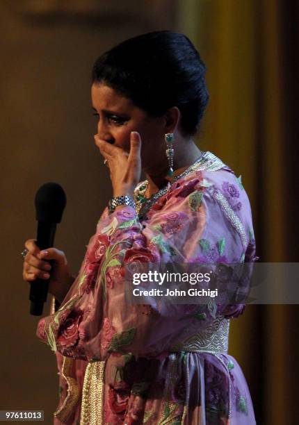 Nawal El Moutawakel becomes emotional while accepting her " Lifetime Acheivement" award on stage during the Laureus World Sports Awards 2010 at...