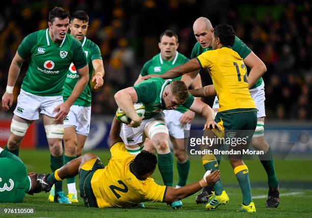Melbourne , Australia - 16 June 2018; Dan Leavy of Ireland is tackled by Brandon Paenga-Amosa, left, and Kurtley Beale of Australia during the 2018...