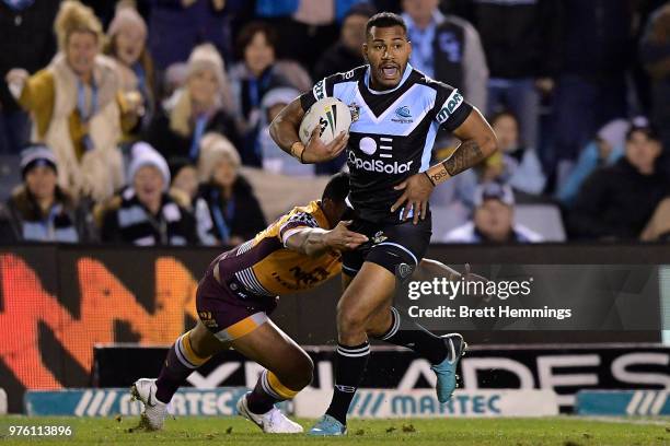 Sione Katoa of the Sharks makes a break during the round 15 NRL match between the Cronulla Sharks and the Brisbane Broncos at Southern Cross Group...